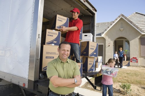 Professional movers handling furniture in Crystal Palace