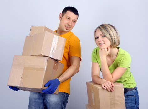 Removal professionals loading items safely for transport in Crystalpalace