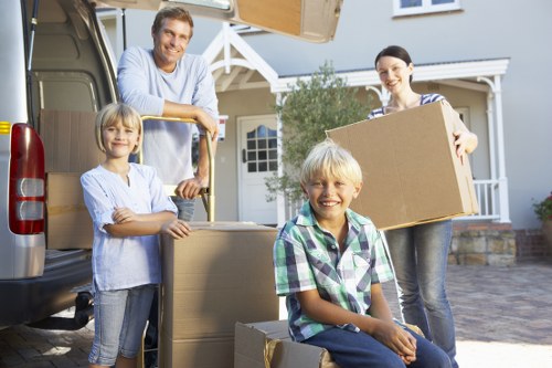 Professional movers handling furniture during a local relocation